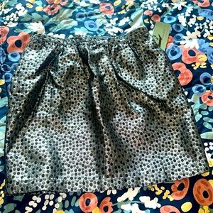 Mini skirt with black and silver dots